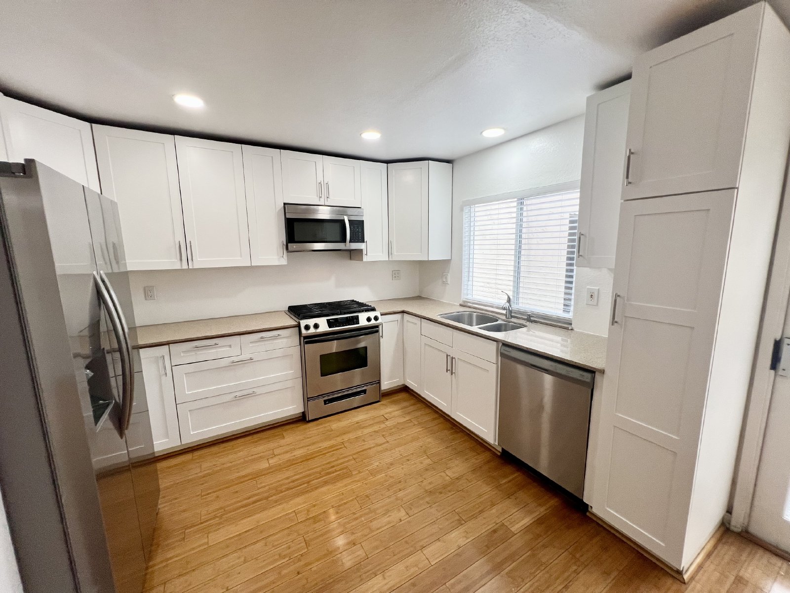 Stunning 4BR Townhome with Hardwood Floors, Private Patio, Community Pool & 2-Car Garage! property image