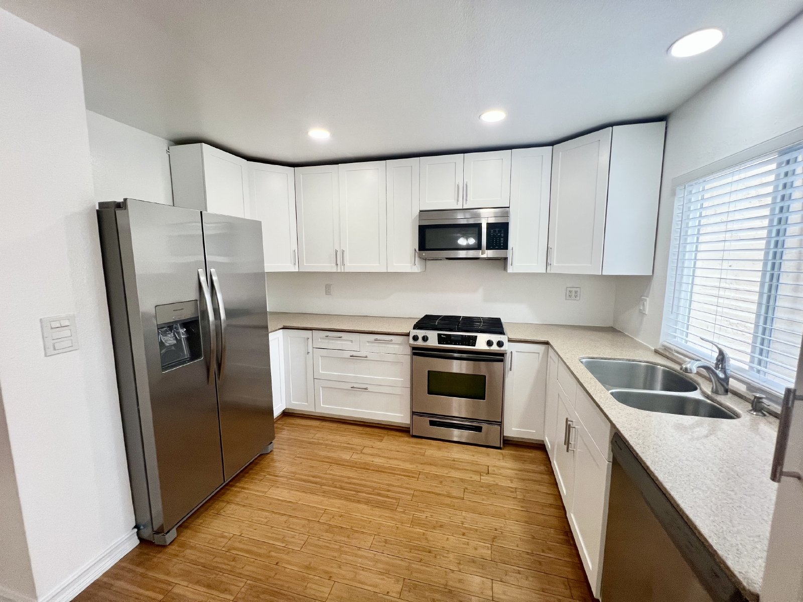 Stunning 4BR Townhome with Hardwood Floors, Private Patio, Community Pool & 2-Car Garage! property image