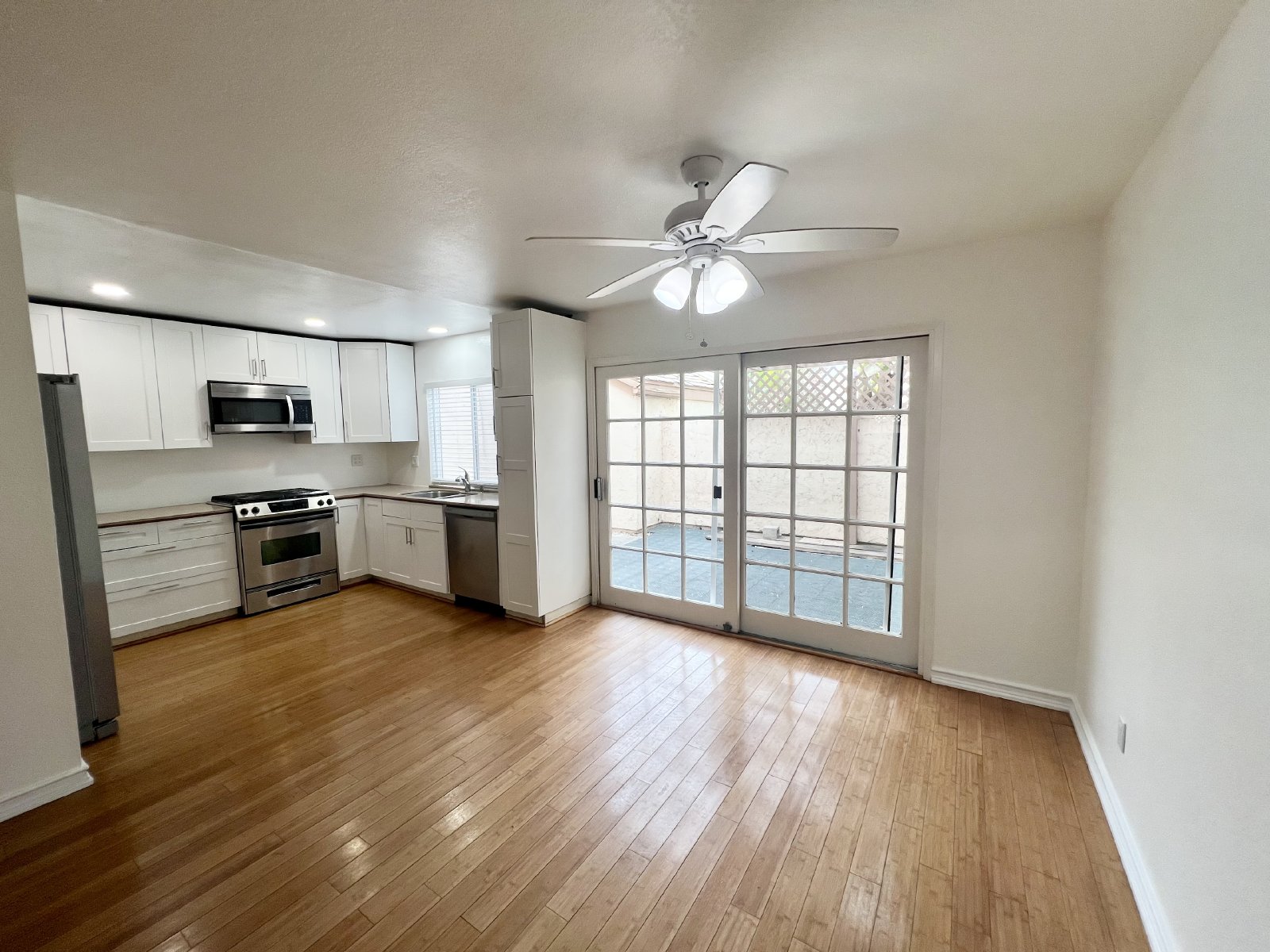 Stunning 4BR Townhome with Hardwood Floors, Private Patio, Community Pool & 2-Car Garage! property image