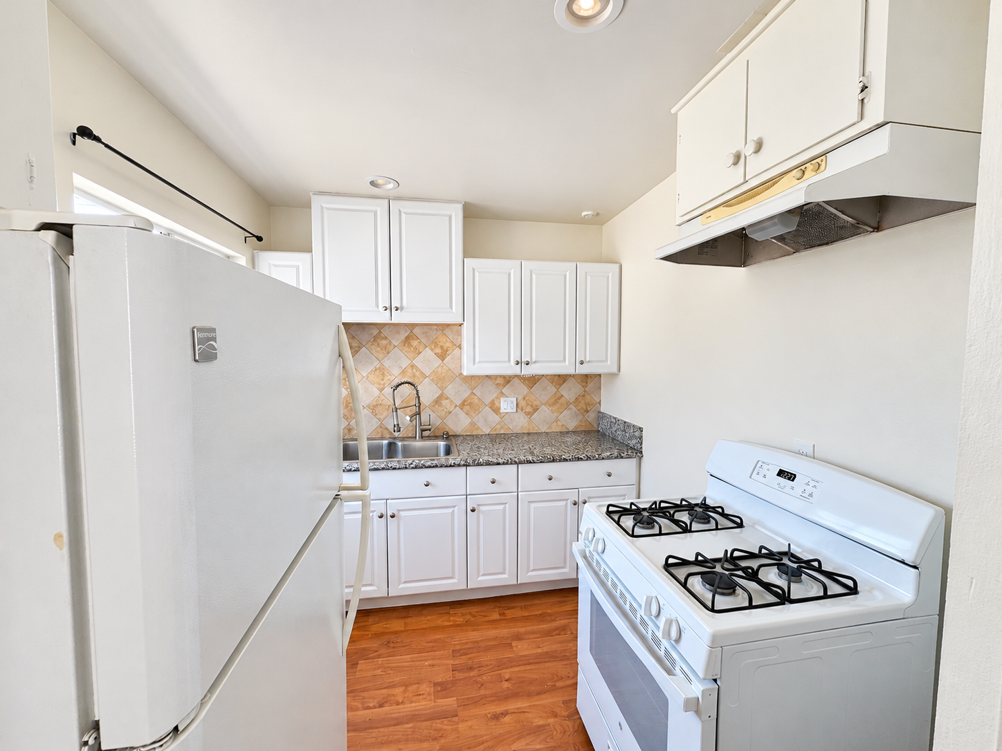 Welcome to this 1-bedroom, 1-bathroom upstairs apartment located in the vibrant Normal Heights property image