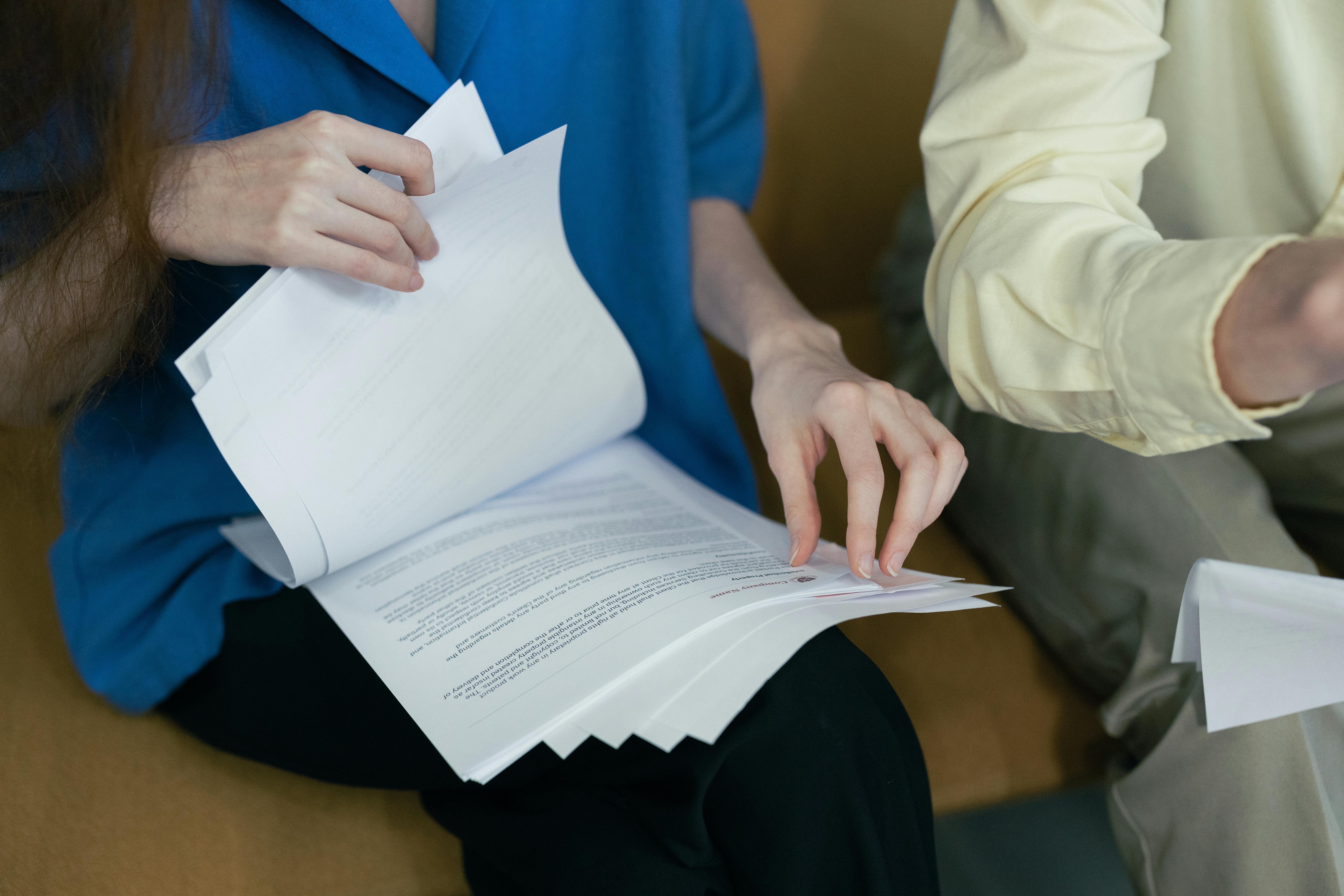 A lady reading documents