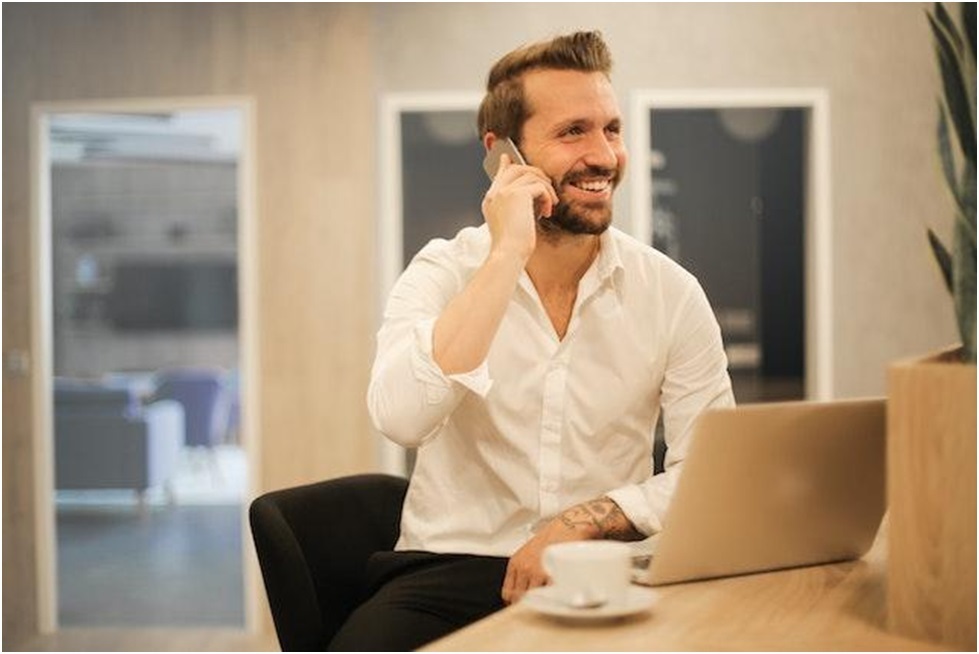 realtor-talking-on-the-phone-happy